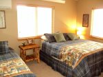 Upper level bedroom 3 with queen bed, twin bed